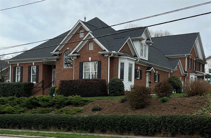 Rare find! This top-quality townhouse is located in the heart of downtown Hickory on North Center Street, just a few blocks from the SALT block and Union Square. Offering over 3,200 HSF on two levels, this three bedroom end-unit features a vaulted ceiling great room, den with fireplace flanked with built-ins, and a cozy sunroom exiting to the rear terrace. The kitchen offers updated stainless appliances, center island, and dining area. The huge master suite offers double walk-in closets, jetted tub, tiled shower, and double vanity. The main level also features an oversized double garage, laundry room with sink, and walk-in pantry. Upstairs, a loft area opens onto two spacious bedrooms sharing a Jack & Jill bathroom. Walk-in attic storage off one of the upper level bedrooms. Small, two-unit complex with no HOA dues.