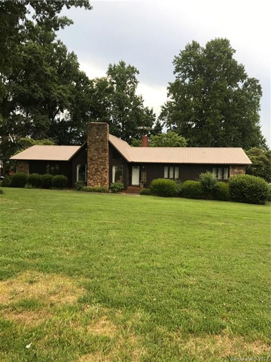 Older home in excellent condition in Mooresville Graded School district. Private setting on 1.38 acres. Open floorplan with vaulted ceiling that gives it the feel of a larger home. Beautiful landscaping with fenced-in yard. One owner home, rooms are large and lots of storage. 2 fireplaces-one being gas. Well cared for home and a must-see!