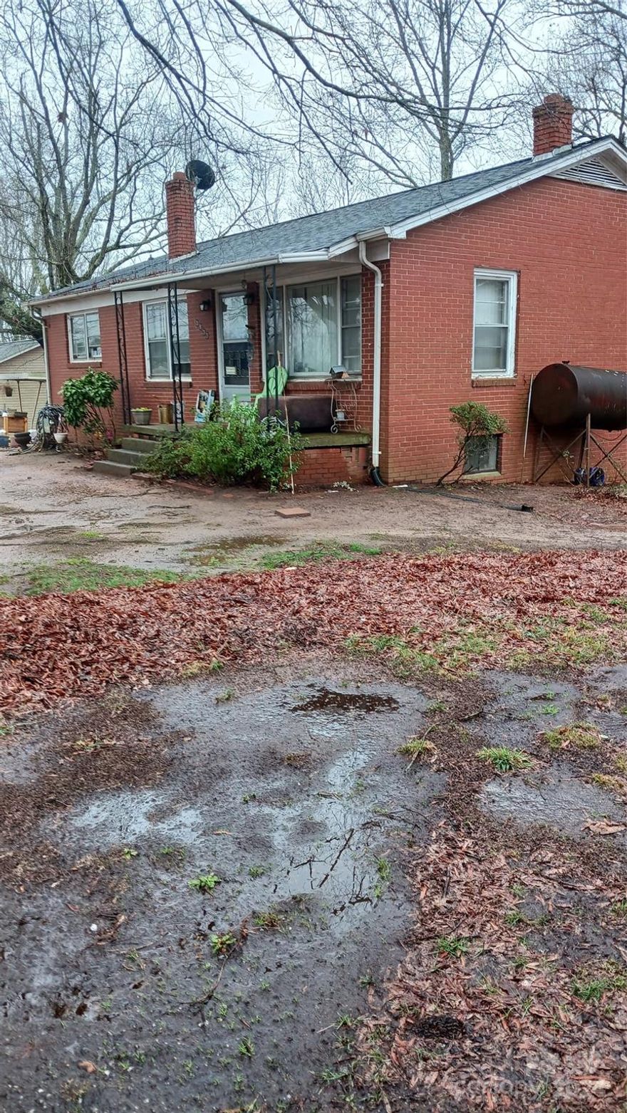 This all brick home w/full basement is located close to Startown Road and Highway 10 intersection on over an
acre of land.  Currently tenant occupied with a 24 hour notice required for showing.  Tenant will need to remove dogs from home and open for viewing. This older home has potential but will require many updates and renovation.  City water.  Note: There is an above ground fuel tank; however, tenant currently using their personal wood stove for heating and this will be removed. There is a bathroom in the basement area and tenant advised that it is in
workable condition.  No info if this was incl in original permits.   Seller would like to sell home in current condition.  Listing firm does not hold Earnest Money Deposits.  Storage Building remains.