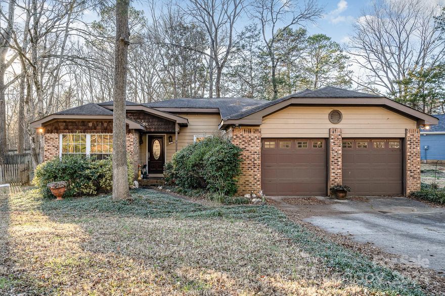 Escape to suburban bliss in this delightful 4-bedroom, 2-bathroom home located in the serene Woodland Creek Plantation community in Charlotte. Offering a cozy retreat with an open floor plan, this residence is perfect for families seeking comfort and convenience. Large backyard perfect for entertaining, home needs a little work but in great location convenient to shopping and restaurants.