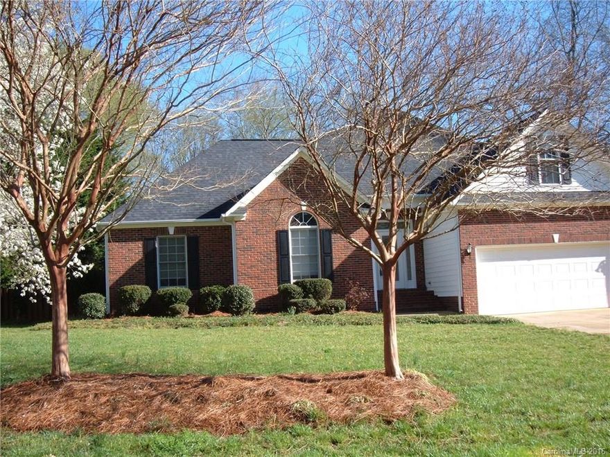 Adorable 1.5 story home with 3 bedrooms plus huge 4th bedroom/bonus room up stairs. Home features many vaulted/cathedral ceilings, heavy crown molding, recessed gas fireplace with lighting. Huge fenced in back yard, screened in porch and large deck for entertaining and relaxing. Lot has mature trees and landscaping.  New carpet,new paint & gorgeous refinished hardwoods and new Roof too!  Home is move-in ready!!!