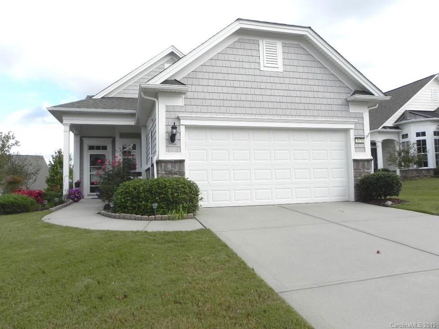 This bright cozy Fox Run 2BR/2BA with sunroom sits on a lot with a large side yard, lush landscaping, drip irrigation and awning over the deck.  It features 4” dark hardwoods throughout, ceramic tile in baths, ceiling fan, blinds and drapes. The kitchen features stainless appliances, granite counters, tile backsplash, saddle cabinets and a gas stove.  The refrigerator, washer and dryer will convey.  Come check out the community and the active adult lifestyle of Sun City Carolina Lakes.