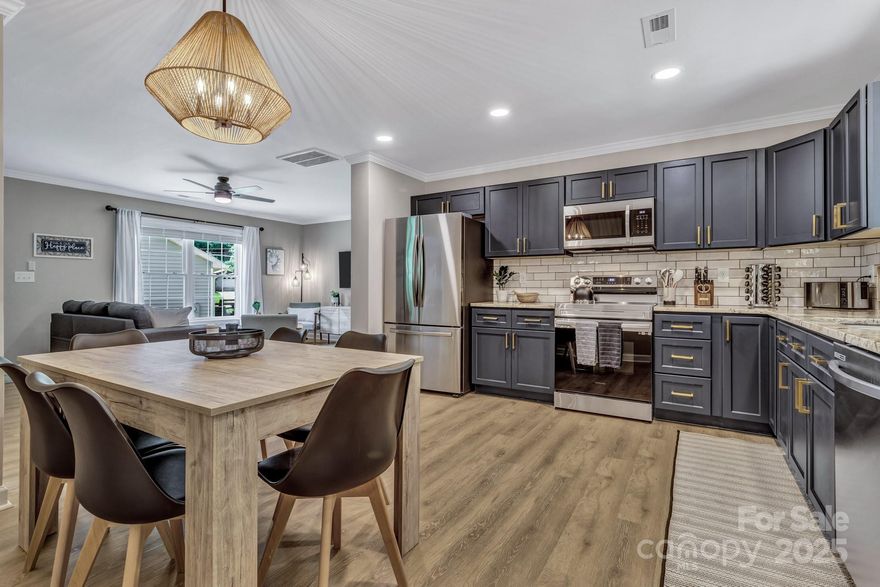 MOTIVATED SELLER! Turn-key investment or second home opportunity in downtown Waynesville! This fully furnished 3BR/2BA 2023-built home is STR-ready and beautifully designed with an open layout, designer kitchen soft close cabinets, gold hardware, and stainless appliances. The spacious primary suite includes a walk-in closet and private bath, separated from guest rooms for privacy. Enjoy outdoor living on the large deck overlooking a peaceful creek. Located in a quiet neighborhood within walking distance to shops, restaurants, and breweries. Move in or start renting immediately! Sleeps 9.  Every detail, from décor to cookware, is included for a seamless setup. Ideal for investors seeking immediate rental potential and 2025 depreciation benefits.