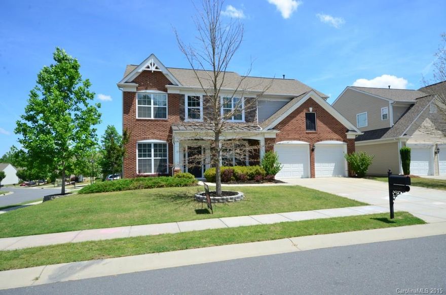 This home sits on a large corner lot, with full sized trees that line the back of the fenced yard and plenty of privacy.  The front of the home is adorned with brick, stone and a sitting porch. The floorplan will impress with it's attractive open layout, granite countertops and hardwood floors throughout first floor and staircase. Office/flex room with french doors on first floor. Beautiful, spacious Master Suite with a large bath and full closet. Save money, blinds throughout, move in ready!