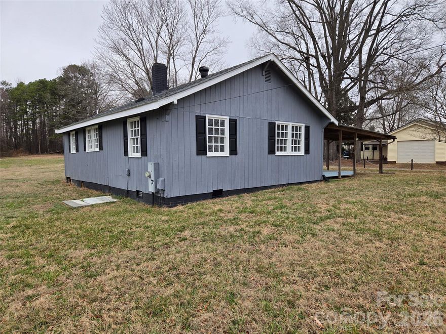Quite street located in the heart of Landis. Home has been remodeled with New roof, New sheetrock interior walls, New paint inside and outside, New  Flooring, Electric , Plumbing , Heat pump, baths, cabinets and Granite counter tops.  The property is completely usable with garden space, and  huge detached garage. The garage is wired with electric service and an overhead Gantry Crane system for moving heavy equipment anywhere in the shop..**Motivated Seller***
The home is currently on a shared well but will be connected to City water at the street.