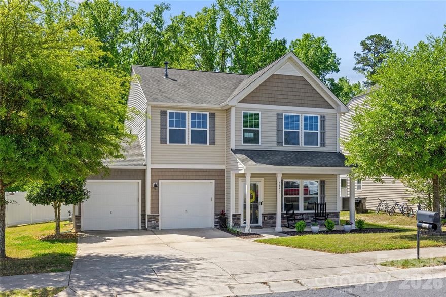 Welcome to this immaculately maintained home in the Newport Lakes community, where convenience meets comfort with easy access to shopping and dining and all the exciting growth coming to the Newport area of Rock Hill.  Step inside to a flexible room right off the entry that can serve as a home office or formal dining space, designed to fit your lifestyle. The main level features an open-concept and inviting layout filled with natural light. The kitchen is a true centerpiece, complete with stainless steel appliances, oversized island, a butler’s pantry, great storage, and a breakfast area that flows seamlessly into the living space. The main level is perfect for everyday living and entertaining.  Upstairs, you’ll find an oversized primary suite that feels like a retreat, featuring a spacious sitting area, great en-suite bathroom, and huge walk-in closet. A versatile loft provides additional living space, along with generously sized secondary bedrooms and a full bath. Outside, enjoy sitting on your front porch or the recent patio addition in the fenced backyard that still allows a view of the beautifully wooded natural area behind you.  With recent upgrades to the paint and flooring as well as a new HVAC (2025), this home is truly move-in ready and provides peace of mind for maintenance! This home offers the space, flexibility, and location you’ve been looking for.