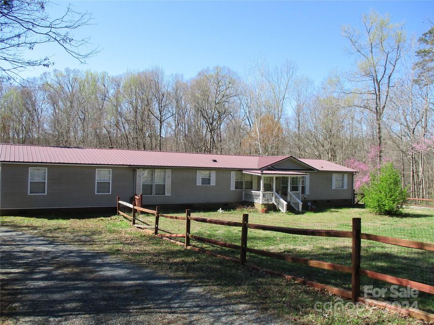 Nice 3 bedroom, 2 bath home with a large lot with many possibilites.  A large bonus area was added to the home, has air conditioning but no heat installed.  Home sale also includes 3.26 acre lot next to the property.