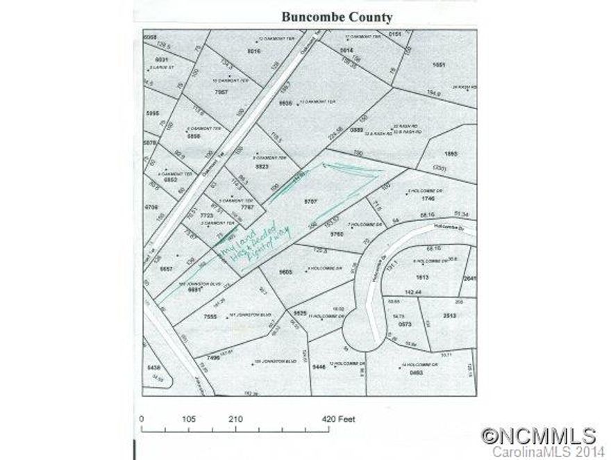 Large lot behind #163 Johnston Blvd with deeded right of way to old homesite that burned down. Old septic filled in. Use caution walking property, fairly level nice old plantings, fruit trees and berry bushes. This could be a hidden gem of a homesite.