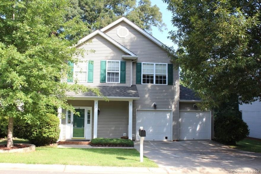 Beautiful home located in convenient area of Belmont!  Maintenance free exterior. Good sized lot with plenty of backyard privacy.  Rear of lot has a terrace and great patio space inside the fenced backyard. Open floor plan downstairs makes for a wonderful flow. Laminate flooring throughout except for new carpet on stairs and in master closet.  Master Bedroom is large with great bath and huge closet!  Upgraded hardware throughout, ceiling fans in most rooms, 2" inch faux wood blinds throughout