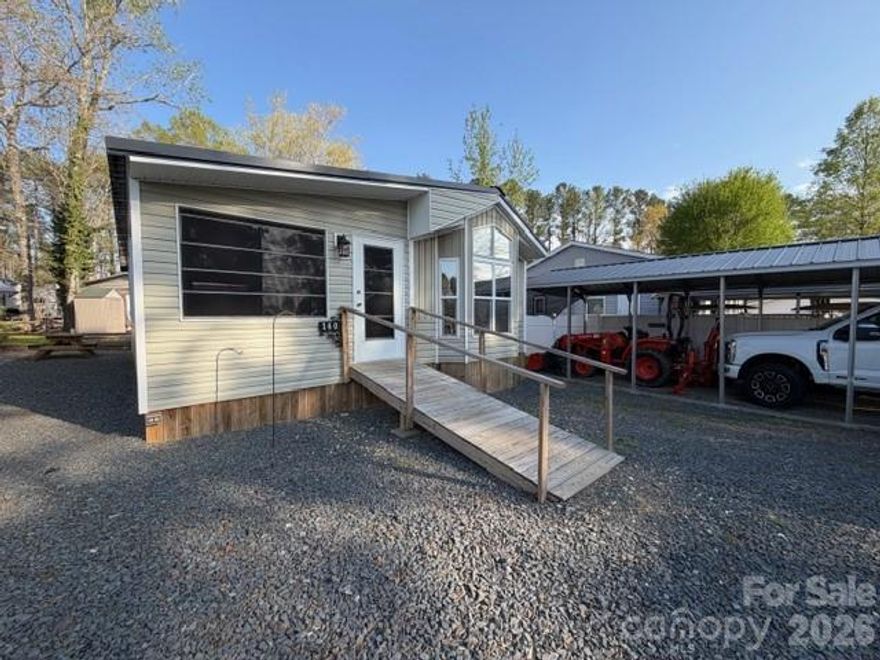 New Listing 1 Br, with new roof, new heat pump, carport, level lot, updated electrical plumbing all in 2024, Enclosed porch with easy breeze windows, shiplap walls, wood ceilings, electric fireplace, strg building.  Buyer gets first right of refusal to purchase additional lot where motor home is parked when they decide to sale that property.  This property has so much to offer and has had so much updated county considers this property as a 2024 model now.