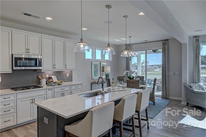 MLS#3924213 REPRESENTATIVE PHOTOS ADDED. Summer Completion! The Waverly at Walden features
an airy open-plan concept with a large family room and gourmet kitchen complete with large walk-in
pantry, butler’s pantry, and luxurious food prep island. Guest suite at the rear of the home along with a
study and sunroom are also located on the first floor. A convenient mud room off the 2-car garage keeps
your interior clean while providing coat storage and access to the downstairs bathroom. An extraordinary
owner’s retreat stretches out across the rear of the second floor. The second level features 3 additional
bedrooms, two full baths, and a spacious loft. Structural options added include: Tray ceiling at owner's
suite, 1st floor guest suite with shower, owner's bath 2, sunroom, study in place of dining, laundry sink,
additional windows at owner's suite, casual dining, loft , study and bed 4, fireplace, tankless gas water heater, insulated garage.