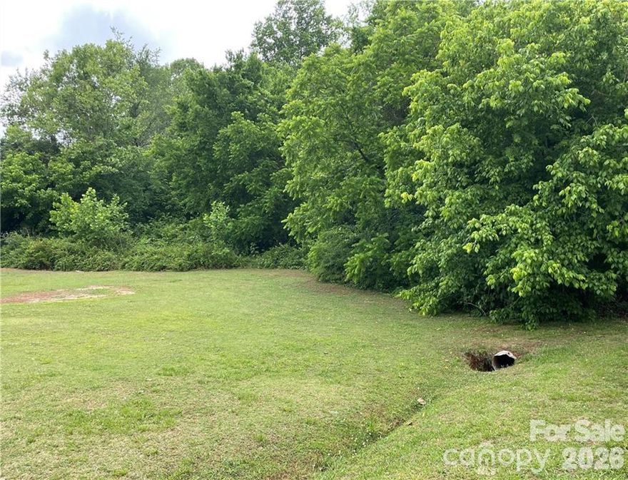 Nice, level lot next to creek in a beautiful and peaceful manufactured home neighborhood.