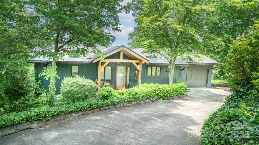 Quintessential lake front cabin on Lake James in the sought after Holiday Shores subdivision.This is a beautiful 3 bedroom, 2 1/2 bath home with outstanding views and water access.The house is located on a private wooded lot and comes furnished(exclusions list). Private dock with two boat slips(one covered), screened in bunkie house on shore and jet ski dock. The open floor plan and windows allow views from every room including the main floor primary bedroom with a fireplace. Lower level screened in porch and main level deck to enjoy the view and beautiful sunsets. One of the closer subdivisions on Lake James with easy access to I-40 (8 minutes) and easy access to Morganton & Marion (15 minutes), or Asheville for great shopping and restaurants. This wonderful home is close to Lake James State Park and beach, Fonta Flora biking and hiking trails, Fonta Flora brewery, and two public golf courses. $25 voluntary HOA dues. Rentals allowed. Owner is a licensed real estate broker.