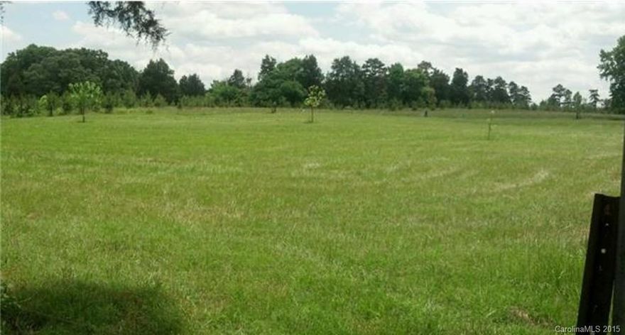 Nice lot, 2 level acres.  Only .2 miles from I-77.  More acreage is available.  Located directly across the street from the GITI Tire Plant.