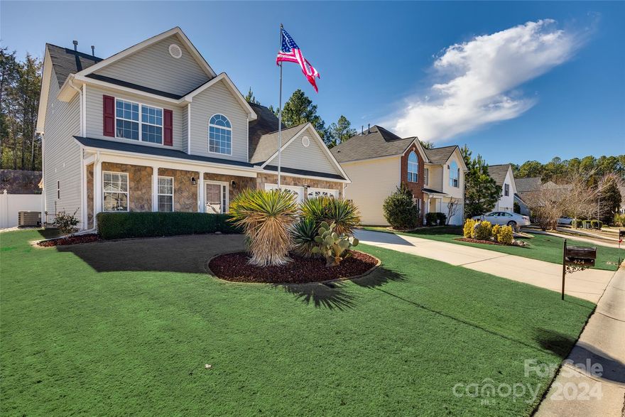 Step inside this meticulously maintained home to an abundance of natural light flowing into the main living area. Hickory hardwood floors grace the entrance and first floor creating a warm ambiance. The heart of this home is the kitchen, adorned with quartz countertops and stainless-steel appliances. It is functional and looks over the family room providing a perfect open floor plan. The family room features a cozy gas fireplace and is large enough for plenty of gatherings with family and friends. As you transition outdoors, discover the expansive paver patio offering a private retreat with a retractable awning providing just the right shade and ambiance.  The beautifully landscaped yard is complete with an attractive retaining wall which provides plenty of seating. The lawn is beautifully manicured, and the charming shed is a useful addition. This home offers an easy commute to Lake Wylie, Charlotte, York, and Rock Hill. No city taxes are a bonus! New roof in 2011, new HVAC in 2018