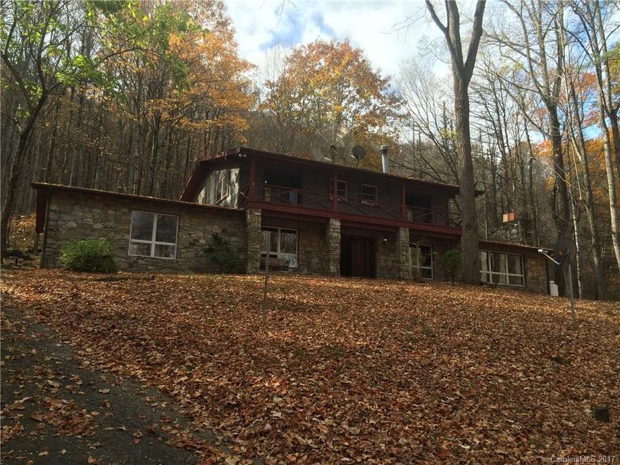 Estate Sale! Gated entrance leads to this private mountain estate. Lots of beautiful rock work and open living area provides excellent space for entertaining guests. Home uniquely crafted to suit this private location. Property is located on 6.34 acres which features tennis court, spring fed pond and large private stone patio. Home features large open kitchen with island, breakfast bar and ice machine. Elegant spiral staircase, formal dining room and generous laundry/craft room.