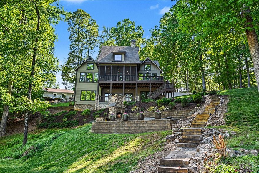 Tucked away on a quiet, wooded 1.23-acre lot with no HOA, this exceptional 4BR/3.5 BA plus flex room lakefront home offers park lke and water views, privacy, and year-round deep-water access. Located in a protected cove with a covered floating dock, power, HydroHoist boat lift, and no wake concerns, it’s ideal for boating, swimming, and paddle boarding.

Designed for relaxing and entertaining, enjoy a large screened porch, outdoor wood-burning fireplace, indoor gas fireplace, and natural gas grill hookup.

Inside, thoughtful upgrades include a chef’s kitchen with Thermador appliances, casement windows, dedicated HVAC for all three levels, tankless water heater, water filtration system, and abundant storage. A versatile FROG with private access through the garage adds additional heated square footage, perfect for a guest suite, office, gym, or recreation space, with even more expansion potential available.

Modern features include whole-house audio, Apple AirPlay, Ethernet wiring, Unifi networking, and surround sound prewiring. HardiePlank siding, irrigation, and two storage sheds complete this low-maintenance lakeside sanctuary.

A full package lakeside retreat!