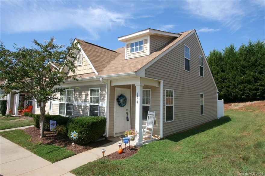 5 minutes from Ballantyne with easy access 485. Wonderful end unit, light and airy with plenty upgrades. Hardwood floor on the main level. Kitchen has corian countertops, breakfast bar and pantry. 2 bedrooms on the main floor and private master bedroom is upstairs. Master has walk in closet and double windows. This is a pleasure to show and won't last long. Private patio.