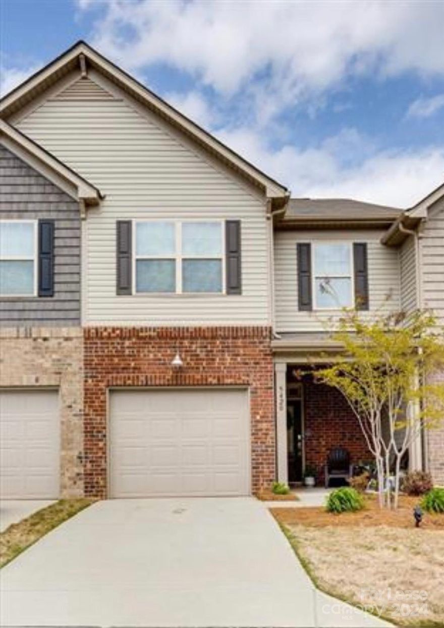 Welcome to this beautiful nearly new 2 story Townhome in the highly desired community of The Greens. This home offers 3 bed/2.5 baths and 1,738 sqft of living space. The spacious open floor plan seamlessly connects the living room, where a cozy gas fireplace awaits to warm your evenings, to the stylish kitchen, making entertaining a breeze. The kitchen is a chef's delight, boasting a large granite island that doubles as a breakfast bar, complete with a gas range and stainless steel appliances. Step outside from the living room onto the screened-in porch, where you can enjoying the fresh air and serene surroundings. On the second level you will find the Large primary bedroom w/en-suite, walk in shower, double vanities & soaking tub and two guest bedrooms and bath. You'll enjoy having your laundry upstairs for convenience. Easy Walk to NEW shopping center, restaurants and grocery store. Located close to Hwy 521, Ballantyne, I-485 and I-77 as well as the schools for this property.