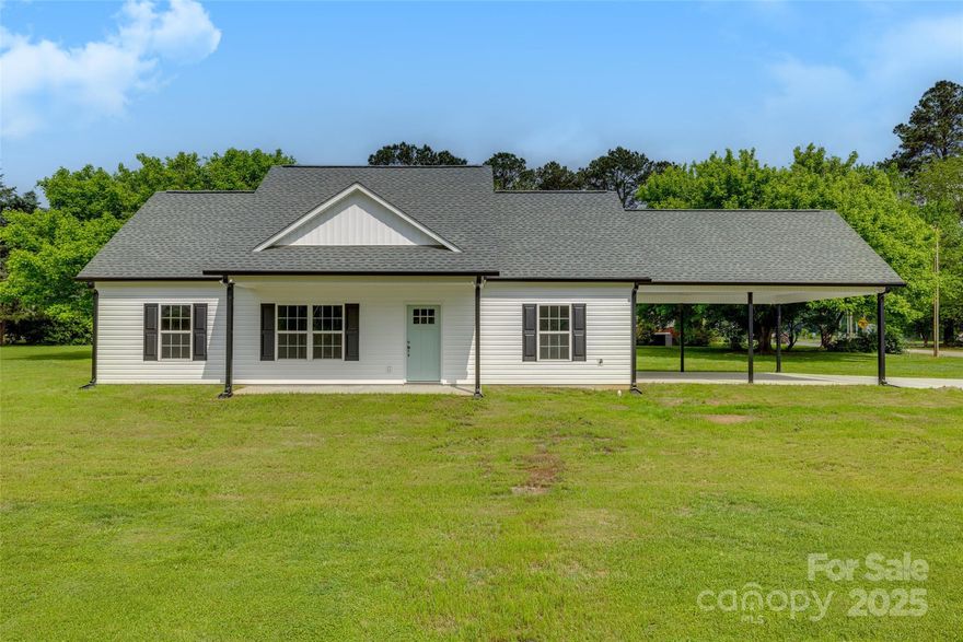 Brand new construction in Fort Lawn SC! This beautiful 3-bedroom, 2-bath home sits on a flat and spacious 0.60-acre lot, offering plenty of outdoor space for play, gardening, or entertaining. Inside, you'll love the open layout and stylish finishes, including LVP flooring throughout all common areas—durable, low-maintenance, and perfect for modern living. The kitchen and living spaces are designed for comfort and functionality, making this home ideal for both daily life and gatherings. Step outside to a covered 2-car carport and enjoy the benefits of an oversized concrete driveway—great for extra parking or a clean space for outdoor activities. This move-in-ready home combines quality craftsmanship with thoughtful design, all in a convenient location with easy access to nearby towns and highways. Don’t miss your chance to own a brand new home with space to spread out—schedule your showing today!