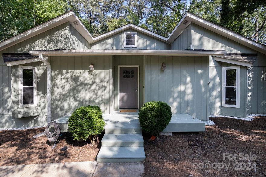 Welcome to this must-see fully renovated ranch home nestled in historic Tega Cay. Step inside to discover an open floor plan, vaulted ceilings, custom primary closet, stone fireplace in the great room, and smart home capable light switches throughout. This home boasts a new HVAC in 2020, new driveway & patio in 2021, tankless gas water heater, spacious attic for storage, and fully encapsulated crawl space to give you peace of mind in the years to come. The 3 season room easily converts to a screened porch and overlooks the private, wooded back lot. Located in a peaceful neighborhood with top-rated schools and no HOA, you'll find yourself close to the Greenway, pickleball & tennis courts, driving range, golf, lake views at Windjammer Park & delectable dining options at the clubhouse, all with no membership fee required. This home offers the perfect blend of style, comfort, convenience and the location Tega Cay has to offer!