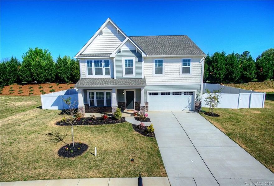 LOADED, immaculate, move-in ready home in highly desired Newport Lakes neighborhood.  This home has tons of upgrades, more than the builders even offer.  Gorgeous hardwoods, granite countertops, ceramic tile baths. Spacious kitchen open to great room with huge bar.  Four bedrooms with an additional study, bonus room and sitting area in the master bedroom.  This home truly has it all.  Beautiful evergreens line the back of this nearly 3rd acre, fenced-in yard.  Don't miss this one!