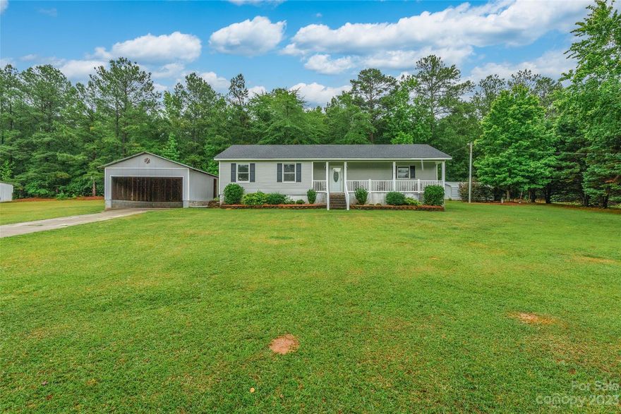 This adorable 3 bedroom, 2 bathroom ranch offers all the privacy and convenience of country living! Situated on over 2 acres of private land in Jefferson, this home has bright and open rooms, a sunroom, and covered parking. A separate cabin in the back yard has a rocking chair front porch and endless potential uses. There is a covered grill shed, detatched metal shop, and a 4 stall barn with a feed room and wash bay. Plenty of outdoor storage and made private from the road by an established tree line.