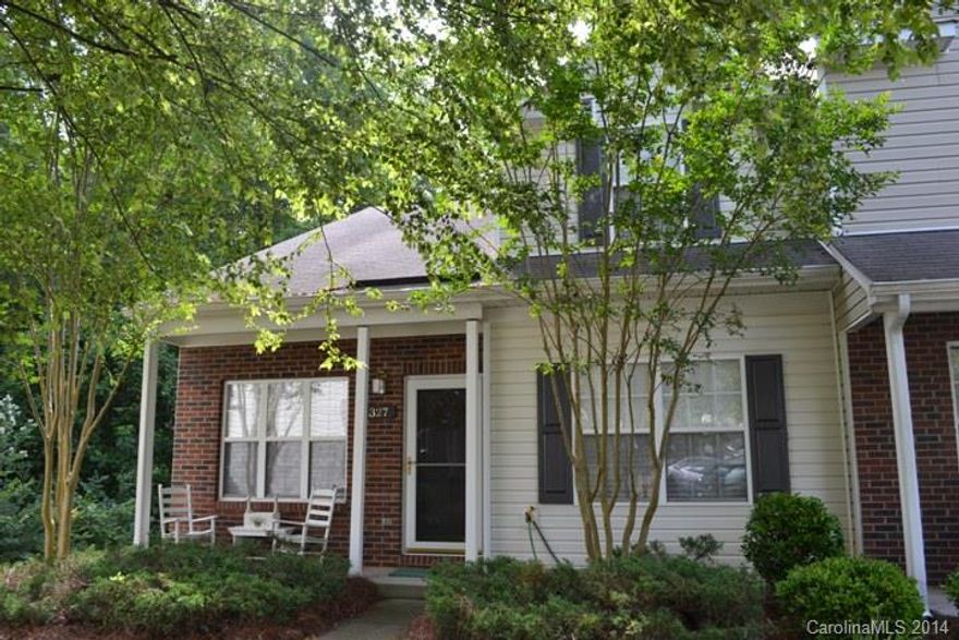 Beautiful end unit townhome shows like a model home!  This unit offers three bedrooms, three full baths, office, and a bonus room which has a fireplace!  There is a two-story great room with another fireplace.  Master on main level.  Spacious kitchen and eating area.  Deck, patio and a front porch!  Very few floor plans like this one and it's located in back of neighborhood.