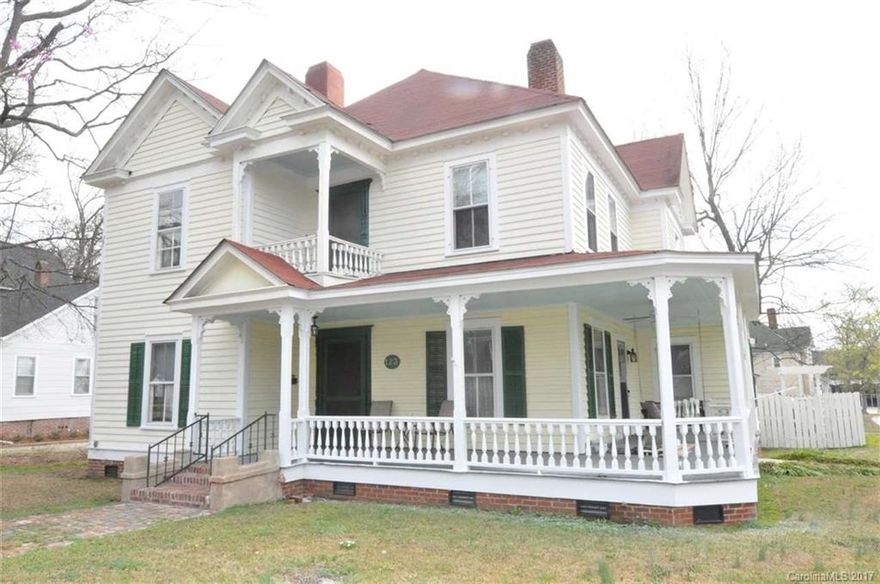 Beautifully restored Queen Anne Victorian. 5BR/3BA, 3642 sq ft, brand new gourmet kitchen w granite counter tops & island, breakfast nook w bay window, all appliances remain. Master suite downstairs, very large bedrooms, formal living room & dining room, spacious laundry room & den, hardwoods throughout, sleeping porch, rocking chair wrap-around front porch, private back yard, detached garage, potting shed, in-town convenience (walking distance to post office, banks, churches, and downtown).