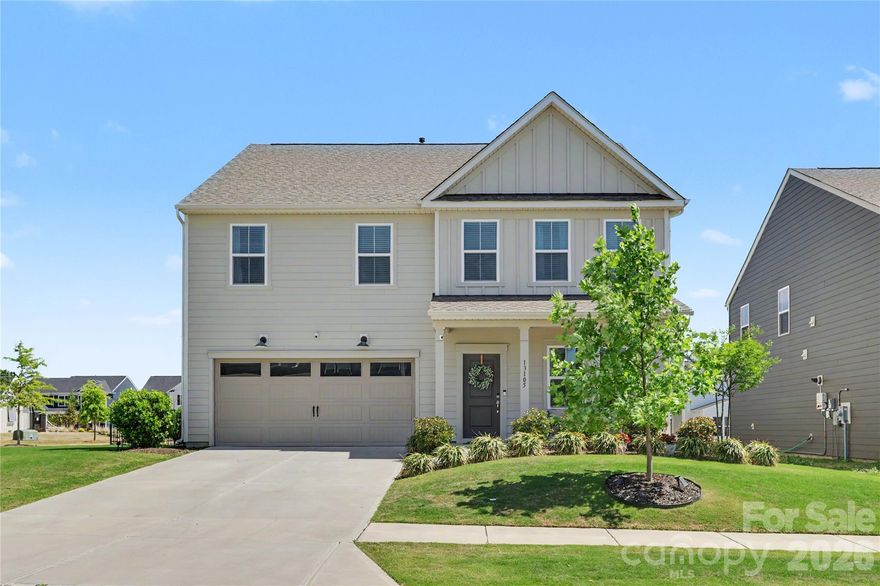 Check out this stunning, like-new home in the sought-after Parkside Crossing neighborhood! Less than three years old, this property is perfectly positioned directly across from the community amenities, including a swimming pool, clubhouse, playground, and cabana. Inside, the popular open floor plan features 5 spacious bedrooms, loft, 3 bathrooms, dedicated office and including a convenient guest suite on the main level. The heart of the home is a gourmet white kitchen complete with a butler’s pantry, flowing seamlessly into a large living room.
Step outside to your private, fenced-in backyard featuring an extended patio—perfect for entertaining. Bonus: Your HOA fee includes high-speed internet and TV, providing monthly savings! Located just minutes from Lake Wylie, Charlotte Douglas Airport, and the energy of Uptown Charlotte.  This property is conveniently located near Unity Classical Charter School, which serves grades K–8.