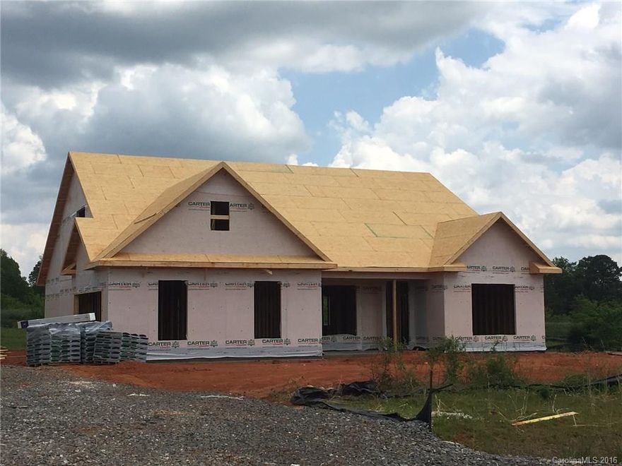 Well designed floor plan with open Living Space. Formal Living & Dining Rooms, Large Great Room with Gas-Log Fireplace open to Kitchen and Breakfast Bar - Granite Counter Tops, Stainless appliances including Refrigerator and Gas Range. Hardwoods in main living areas.  Spacious Master with Tray Ceiling, Two closets and Private Owner's Bath. Nicely sized guest bedrooms with guest suite, loft and Full Bath on upper level. Concrete Patio for outdoor fun! Call today for a personal tour!