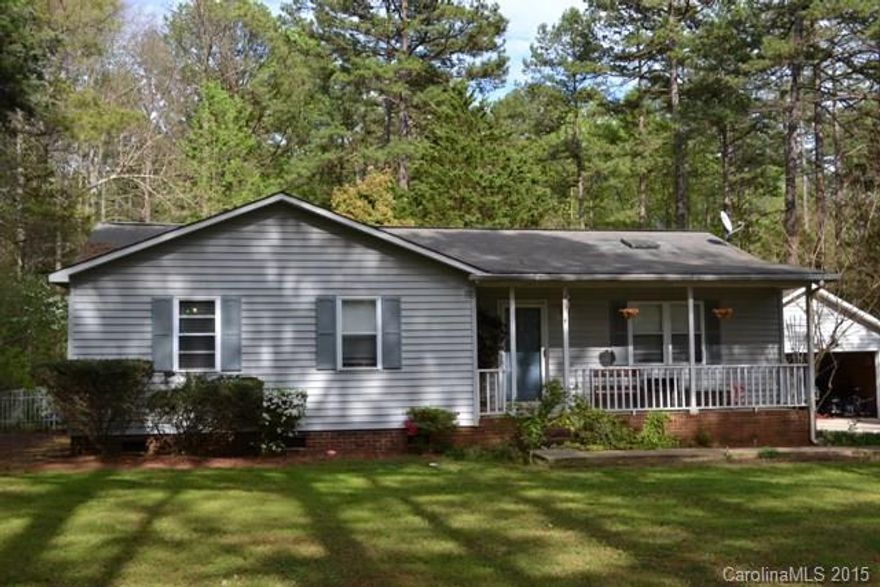 THIS IS AN AS IS SALE.  Detached double garage, deck, hot tub, inground pool.  3 bedrooms, two baths, spacious kitchen and eating area.