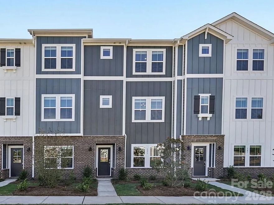 Brand new, energy-efficient home available by Mar 2026! Relax after a long day in the Somerset’s primary suite, complete with a private ensuite and walk-in closet. On the second floor, the sprawling kitchen island anchors the open-concept space. The first-floor bedroom is perfect for overnight guests. New three-story townhomes in Fort Mill, SC bring lower-maintenance and energy-efficient features to the area. With our move-in ready homes, you will find a washer, dryer, fridge and whole-home blinds, guaranteed to close in 60 days or less. (You'll be reimbursed up to $5,000 in expenses related to delays we cause.) Relax in your private primary suite and enjoy the back balcony, all with easy access to Baxter Village and Uptown Charlotte.  Each of our homes is built with innovative, energy-efficient features designed to help you enjoy more savings, better health, real comfort and peace of mind.