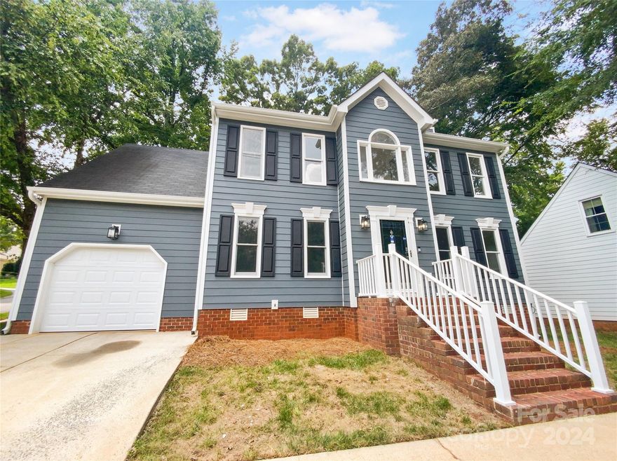 Seller may consider buyer concessions if made in an offer. Welcome to this inviting property that exudes comfort and style. The living room boasts a charming fireplace, perfect for cozy evenings, and is complemented by a neutral color paint scheme that offers a canvas for your personal touches. The primary bathroom offers a separate tub and shower for your convenience, along with double sinks for a touch of luxury. The kitchen is a chef's dream, featuring all stainless steel appliances. The exterior is just as impressive, with a deck for outdoor entertaining in the back yard for relaxation. This property is a perfect blend of comfort and style.