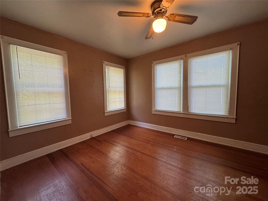 Come see this 2 bed, 1 bath residence, nestled on a generous 0.70-acre lot in Chester, SC. Built in 1940, this classic home features a new roof. Enjoy the comfort of a laundry room and a covered front porch. Inside, you'll find a versatile bonus room that can be used as a home office, playroom, or additional living space. Ask about $3K FLEX CASH!