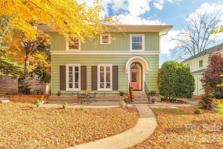 This 1915 Colonial Revival home is located in the Proximity Park historic district of Grove Park on one of Asheville's finest streets. Just a few blocks to the Grove Park Inn, restaurants, groceries & downtown. The partial glass front door and original casement doors and high ceilings make for lovely, light-filled living on the home’s main level. The spacious formal living room with gas fireplace opens to an elegant dining room. The large updated kitchen is a chef's paradise and the adjacent keeping room doubles as a breakfast nook or tv room where you can warm up by the Buck gas stove. Hardwood floors throughout. Open the French doors to the deck from the kitchen & dining room to enjoy an al fresco dinner party. On the lower level relax in the sunny family room where you’ll want to spend all of your time! Park your car in the recently restored detached garage. Recent updates include: new Low-E windows, fresh exterior & interior paint, updated bathrooms, ipe privacy fencing.