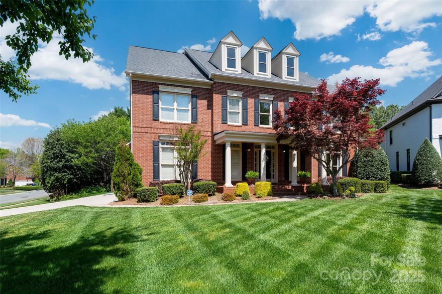 Stunning all-brick home on a quiet cul-de-sac in the desirable BRIDGEHAMPTON neighborhood! This John Wieland Windsor plan is spacious with 6 bedrooms and 5 baths featuring a guest suite on the main level and a large primary suite upstairs with a flex room—perfect for an office, nursery, or gym. Enjoy the beautifully updated kitchen with white cabinets, quartz countertops, SS appliances and a large island, opening to the impressive 2-story family room filled with windows and light. Gleaming hardwoods adorn the first floor.  The very large 3rd-floor rec room with a wet bar is ideal for entertaining or family time!  The crawl space is encapsulated.  Corner lot and mature landscaping that provides ideal privacy.  This home includes a 3-car garage.  Make sure to visit the amazing community amenities: pool, tennis, pickleball, playground, basketball courts, and clubhouse. This home and neighborhood provide the perfect blend of comfort, style, and convenience!