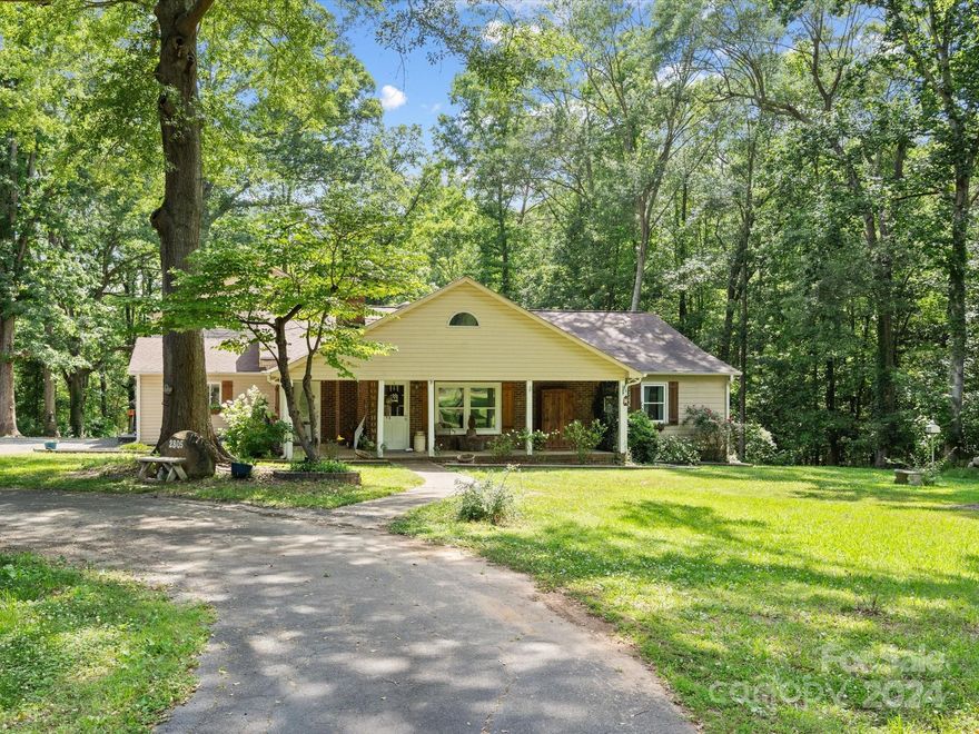 This spacious home provides lots of options! Add your special touches to make it the perfect home for you. This great home offers a large living area, enormous kitchen, main level laundry, main level primary bedroom with en suite bathroom, additional main level bedroom with en suite bathroom, another main level bedroom, office with separate exterior entry, plus two bedrooms and a bonus room upstairs. Enjoy the outdoors on the front porch or in the beautiful yard. 30 x 24 wired workshop/garage. 1.8 acres. Clover School District. Make this your home sweet home!