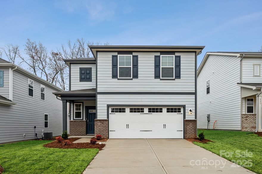 This stunning two-story home offers 2097 heated square feet of spacious living, w/four bedrooms and two and a half baths. The open floorplan is perfect for entertaining guests, & the cozy electric fireplace adds a touch of warmth and comfort. The kitchen is a chef's dream, with beautiful quartz countertops and a large island for meal prep and casual dining. Upstairs, you'll find a versatile loft space, perfect for a home office, entertaining or play area. The primary bedroom features very open space with a very large walk-in closet. Also includes a 2-bay garage, you'll have plenty of space for your vehicles and storage.
This home is being built with a completion date of May, 2025.