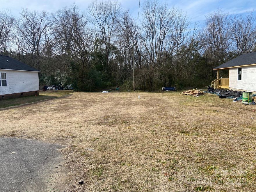 Great opportunity to build in an established Rock Hill neighborhood! This residential lot is zoned SF-4 and city utilities are available (but not yet connected). Nestled in a mature community with character and charm, it is conveniently located just minutes from downtown Rock Hill, shopping and dining. It's also close to Sunset Park School, which is currently being rebuilt with a brand-new facility set to open in August of 2026. A great opportunity for an investor to build a spec home or for someone looking to build their own home.
