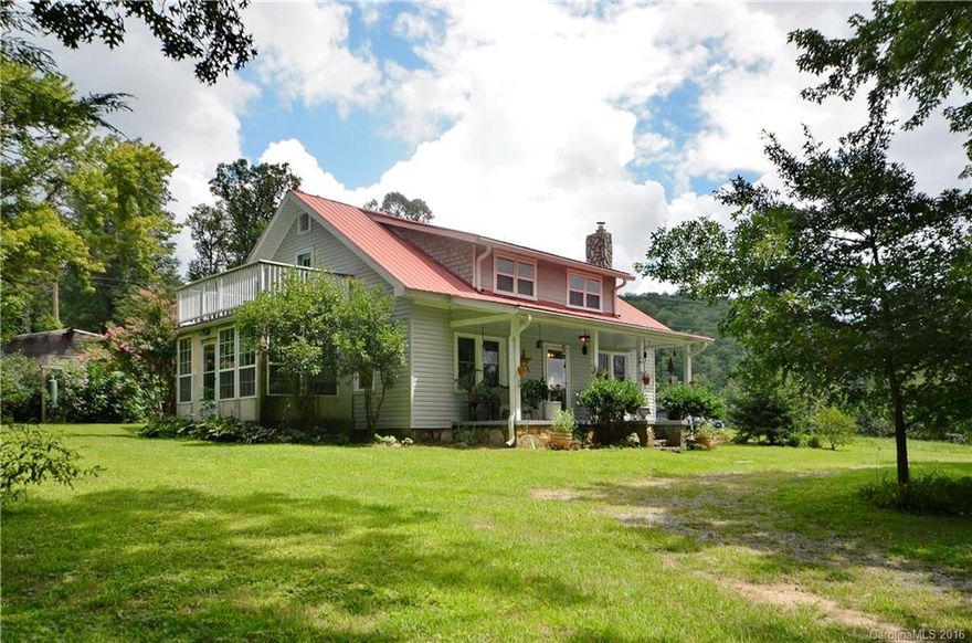 Farmhouse with 2.78 acres! Character throughout! Kitchen island has built-in ice chest and granite countertops  + butcher block. Heat is geothermal heat pump with desuperheater water heater - extremely energy efficient. Wood stove has stainless steel liner. Additional sq ft is studio/office over detached building. 452 sq ft more on 2nd level, ceilings are just under 7 ft. Health dept has no record of septic, but tank is 500 gallons. Beautiful open land  Located next to apple orchard.