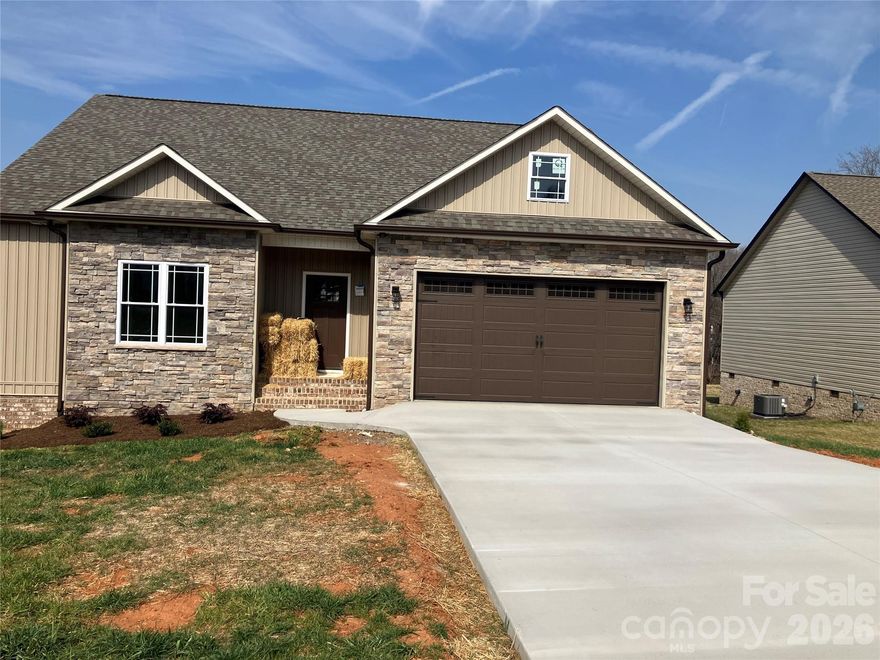 New home in Wallace View Subdivision. Convenient to Hwy 321 and I-40. The home offers 3 ¼ Red Oak Flooring with Natural finish throughout as well, open floor plan, primary bedroom with tray ceiling and strip lighting.  Home also offers custom master closet.  Spare bedrooms have jack & jill bath as well as one half bath.  Basement has been plumbed for a full bath.  Other mentions are tankless hot water heater, extra kitchen storage, stylish fixtures, oversized outdoor deck.  HOA fee of $75.00 covers Spectrum cable and internet.  Pictures with appliances, landscaping and wall to wall cabinets in laundry area.