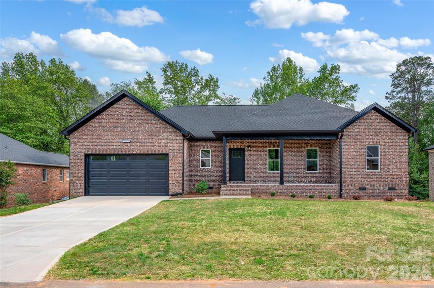 Here's your chance to own a brand new home in the lovely neighborhood of Brentwood! This full brick home features a vaulted ceiling in the living area with an open concept into the kitchen and dining area. Granite counter tops with tile backsplash greet you in the kitchen where all your best meals can be shared. From the dining area, step out onto the back porch where you can enjoy quiet nights or mornings with family and friends. The split bedroom plan allows for privacy in the primary bedroom that features tray ceiling and a luxurious primary bathroom. This home is in an established neighborhood right off Hwy 16, and minutes from I-40. You can easily find restaurants, shopping, or entertainment within minutes. Don't miss on your chance to own this great new home that's perfect for you!