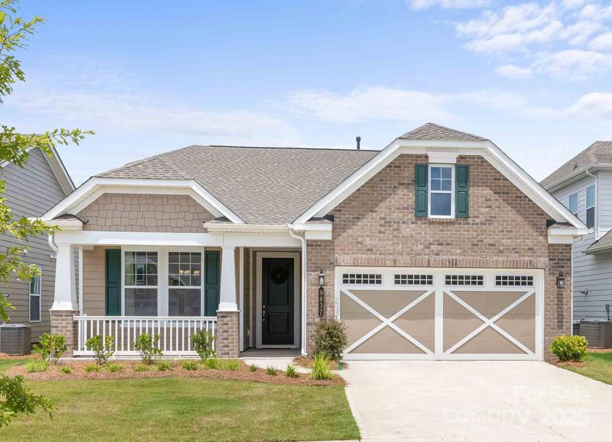 **NEW CONSTRUCTION** This Ashford floorplan offers 2-Bedroom, 2-Bath, and features a Northern-facing Sunroom that floods the space with natural light. The Great Room centers around a stunning fireplace with a granite hearth, creating a cozy yet sophisticated ambiance. The gourmet kitchen is equipped with Quartz countertops and a stainless-steel gas range, while the Owner’s Suite offers dual walk-in closets, a frameless glass shower, and separate vanities for ultimate comfort. A whole-house moulding package and upgraded lighting throughout bring timeless elegance to every room. The furnished laundry room features quartz counters, wall and base cabinets, and a stainless-steel undermount sink. Additional features include a spacious, extended 2-car garage with a 4-foot expansion for extra storage or workspace, plus energy-efficient spray foam insulation in the attic. Step outside and relax on the paver patio just off the covered lanai, perfect for entertaining or unwinding.