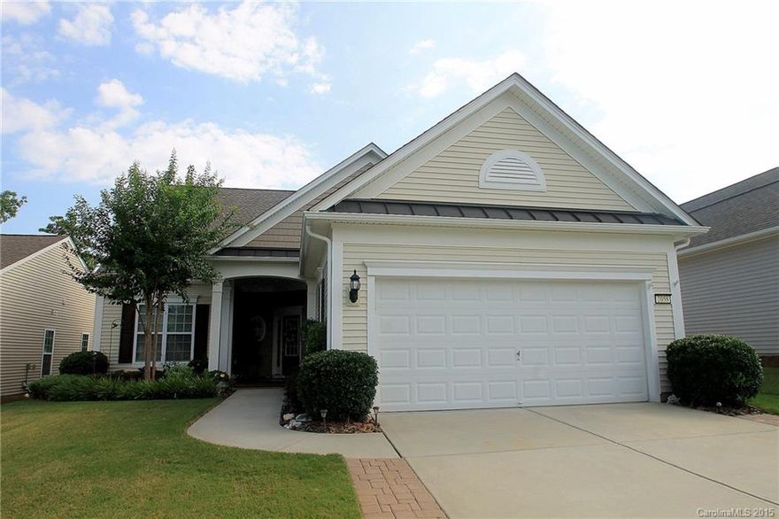 3 Bedrooms/3 Bathrooms Surrey Crest with Loft and Four Seasons Room. 2nd Bedroom/2nd Bathroom on Main Level. Paver Details Along Driveway.  Foyer with Wainscoting opens to Great Room with Gas Log Fireplace.  Kitchen with Granite Countertops, Under Cabinet Lighting, Island, & Dining Nook.  Tranquil Four Seasons Sunroom with Tile Floors and Tile Patio with Landscaping.  Water Views from Most Rooms.  Owner's Suite Leads to Private Bath with Dual Sinks, Shower, & Oversized Walk-In Closet.