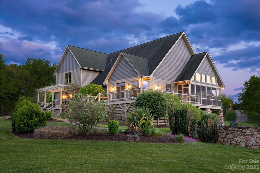 A gated, 10 acre estate just minutes from downtown Asheville with panoramic views. Located within a private, gated community on a quiet cul-de-sac, 93 Plantation Drive consists of a 5,851 SqFt, 4 bedroom, 4.5 bath residence with 3 car garage, Morton Barn with half bath, fenced gardens with greenhouse and chicken coop, and so much more. The custom built home home features superior finishes Features include brazilian cherry floors, an airy and open floorplan, primary suite on the main level, spacious screened porch, wrap around back deck, den/office on the main level, 2 en-suite's on the second level, wine cellar, gym, and more. The gourmet kitchen includes a center island with prep sink, Dacor gas range, walk-in pantry, and built-in's. Additional features to the home include a heated and tiled garage, geothermal heating system, 30 KW generator, Lutron lighting system, water filtration system, and central vaccum. This is the ideal equestrian estate or simply, a pastoral paradise.