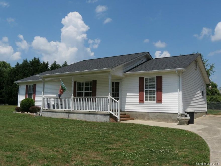 Very nice home sitting on over an acre of land.  Home has a split floor plan with an open living area.  Roof was replaced in 2010 and A/C system replaced 6 years ago.  Nice covered front porch and large yard.  Property is surrounded by trees which creates plenty of privacy.  Back yard is totally fenced with gates at both sides.  Property has a concrete driveway and walkways to front and back doors.