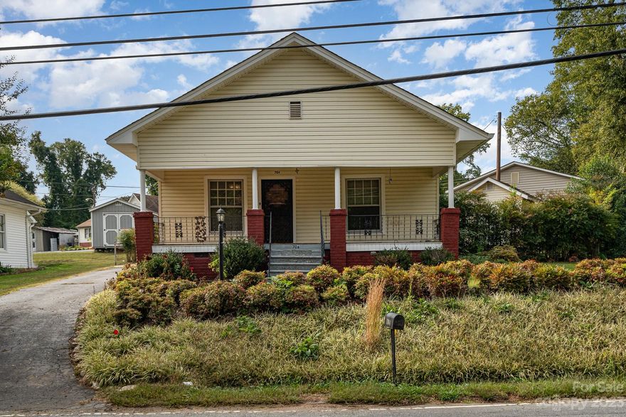 This 1915 bungalow exudes timeless charm & character. As you step onto the welcoming front porch, you'll be struck by the inviting ambiance of this vintage gem. Inside, the interior showcases gleaming hardwood floors and  an open floor plan. The heart of the home is the cozy living room, perfect for relaxation and entertaining. The dining area makes it easy to host family dinners & gatherings. The adjacent kitchen is a functional yet stylish space, complete w/walk in pantry. One of the standout features is the enclosed back porch, providing a versatile space for relaxation or hobbies. The two bedrooms are thoughtfully designed & offer comfortable retreats, while the shared bath retains its classic charm w/updates for modern convenience. The outdoor space features a detached shed for extra storage, a patio & a yard w/endless possibilities for gardening. Conveniently located to local this bungalow is the perfect place to call home! Don't miss the opportunity to own this classic treasure
