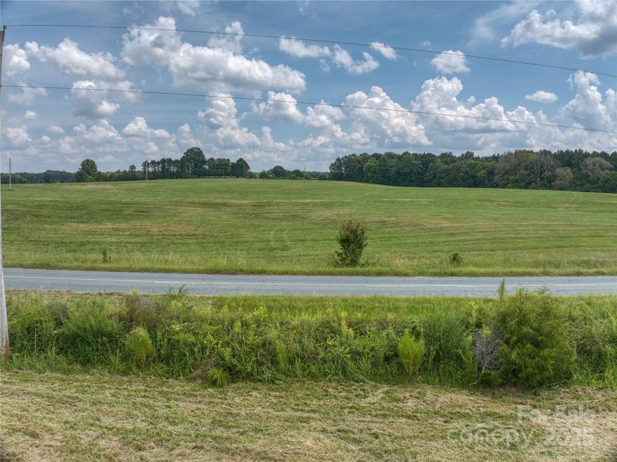 This remarkable 4.647-acre lot (part of an 18-acre track), available outside of the family for the first time since 1901, offers a rare opportunity to own a piece of local history. With ample road frontage, this land boasts picturesque views of lush pastures and scenic countryside. Imagine the serenity of wide-open spaces where the gentile hills cradle wildlife and the whispering winds tell tales of the past. A simple hayfield for decades, this enchanting property invites you to create new memories while honoring its rich heritage. Whether you're seeking a tranquil estate, a charming hobby farm, or an equestrian playground, this land is a blank slate waiting for your vision. Don't miss this chance to invest in a timeless piece of history, where the echoes of laughter and the spirit of nature intertwine. This quiet equestrian community beckons for you to join in on its tranquil pace of life (Restrictions: Architectural review & minimum 4,000 sq.ft. to build, no commercial farming, no subdividing, no pigs, no hunting, and no shooting ranges) LOT2C