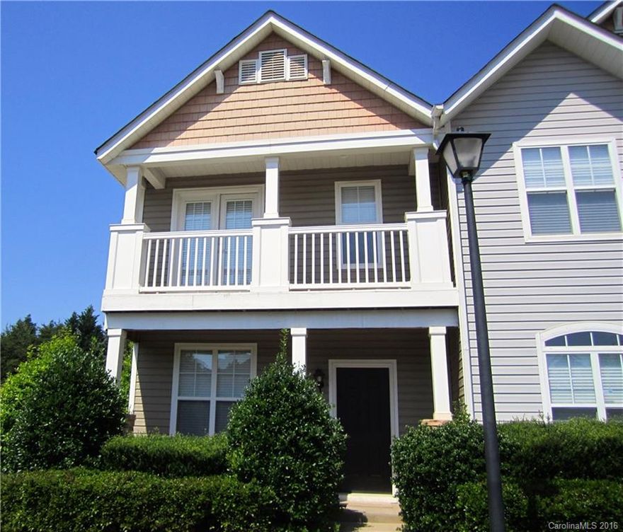 Great opportunity to live in this beautiful updated end unit w/ 2 car garage. Bright & spacious 2BR/2.5BA, perfect kitchen w/42 inch cabinets open to the family room, new engineered hardwoods, freshly painted, upgraded light fixtures & hardware. Bedrooms feature large closets & attached bathrooms, 2nd floor balcony, ceiling fans. Plenty of room for entertaining both inside & out. Walking distance to Ballantyne retail area.  Great school assignment!
